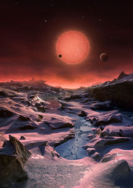 his artist's illustration depicts an imagined view from the surface of one of the three newfound TRAPPIST-1 alien planets. The planets have sizes and temperatures similar to those of Venus and Earth, making them the best targets yet for life beyond our solar system, scientists say. Credit: ESO/M. Kornmesser